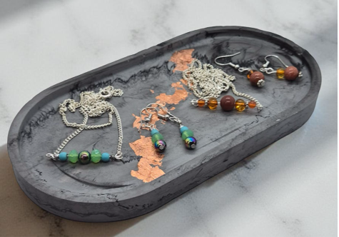 Tray with earrings and necklace