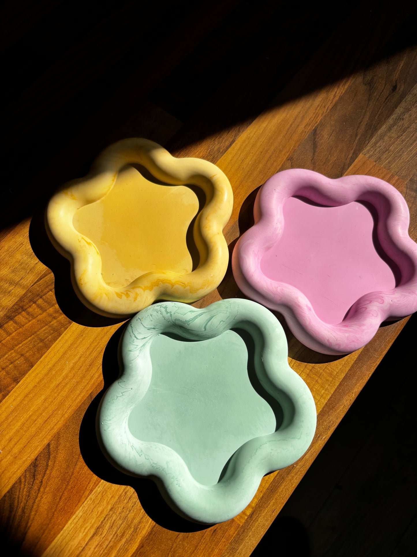 3 flower trays in the sun