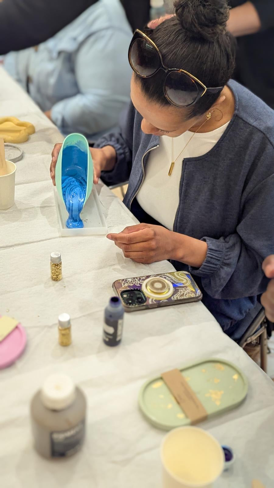 Lady making blue tray