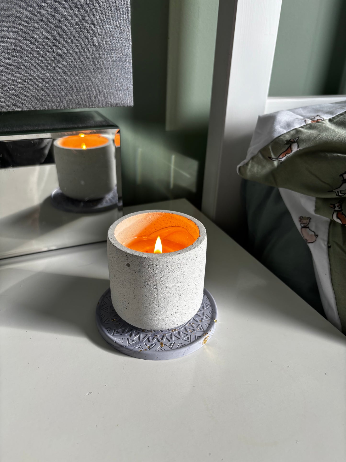 Moroccan coaster sat on beside table