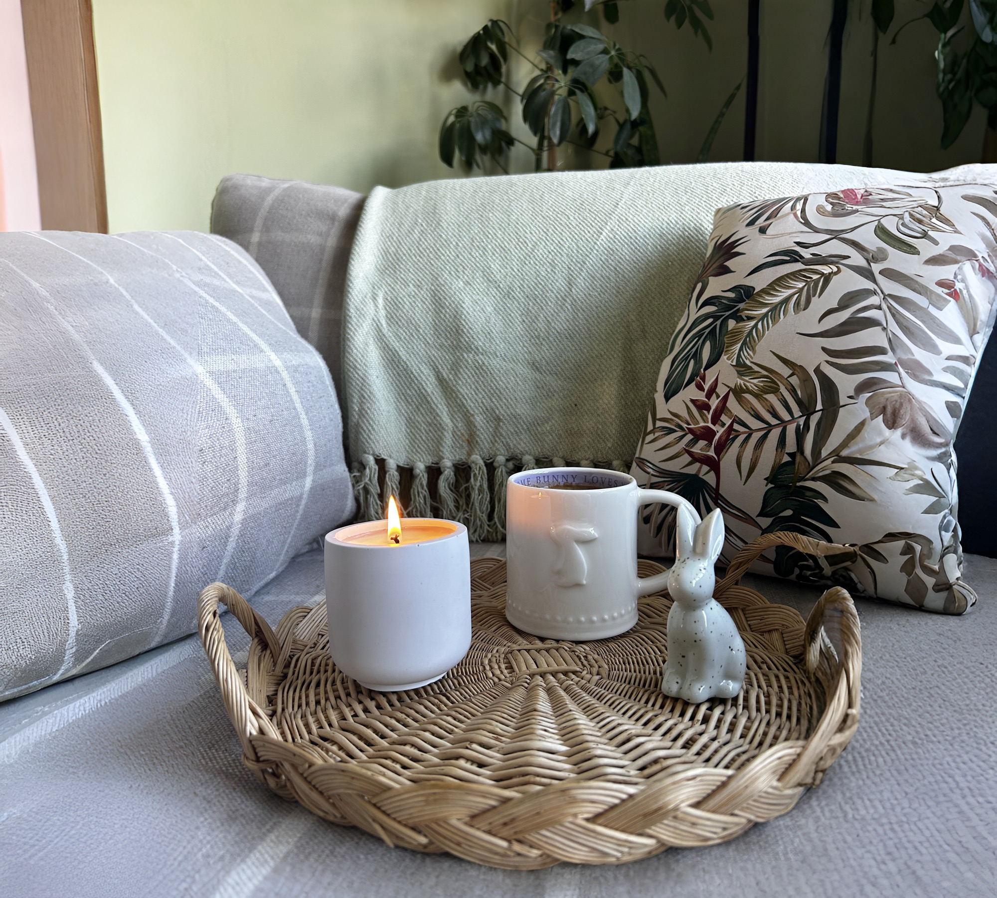candle placed on sofa