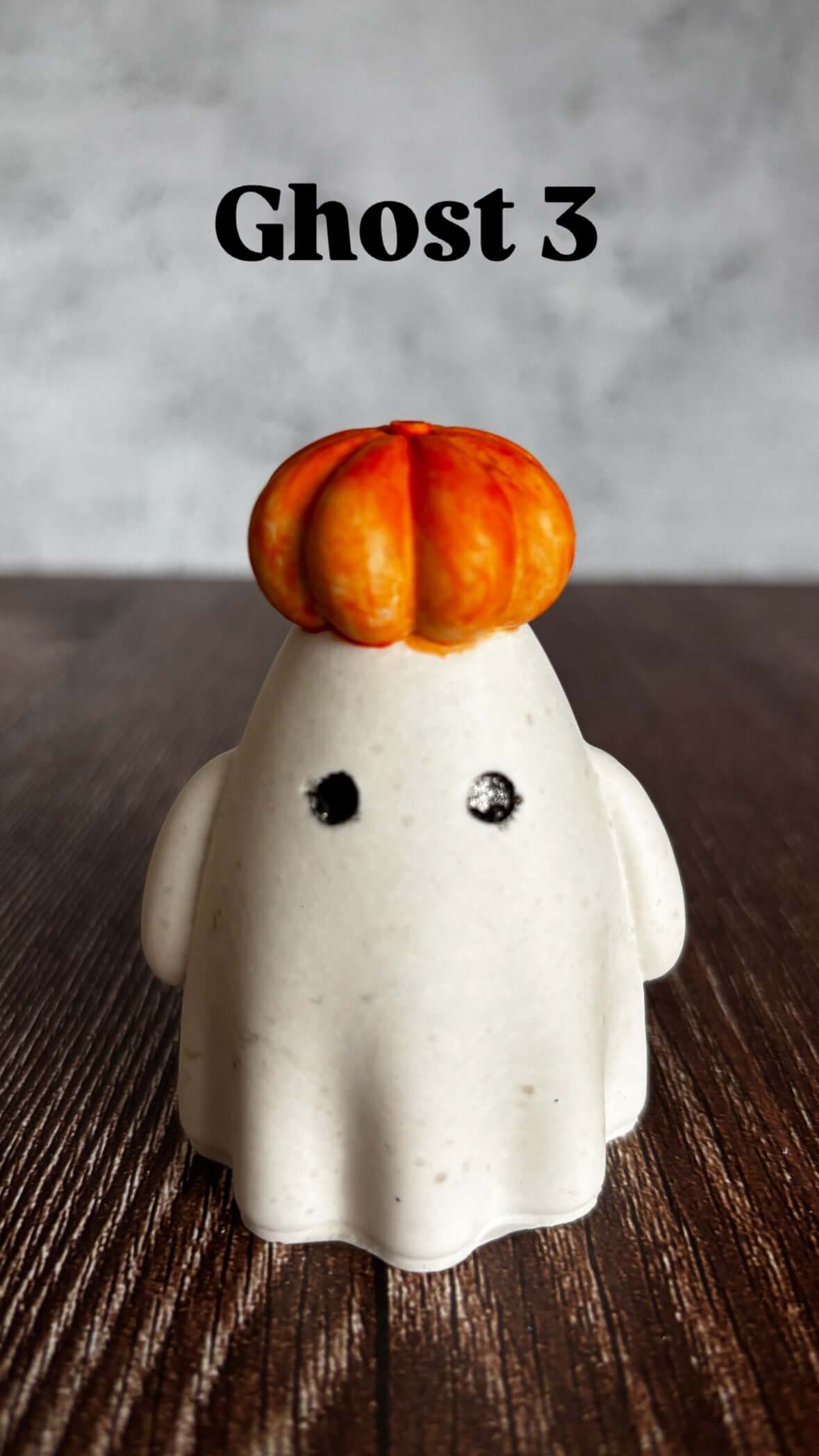 Ghost with orange pumpkin on head