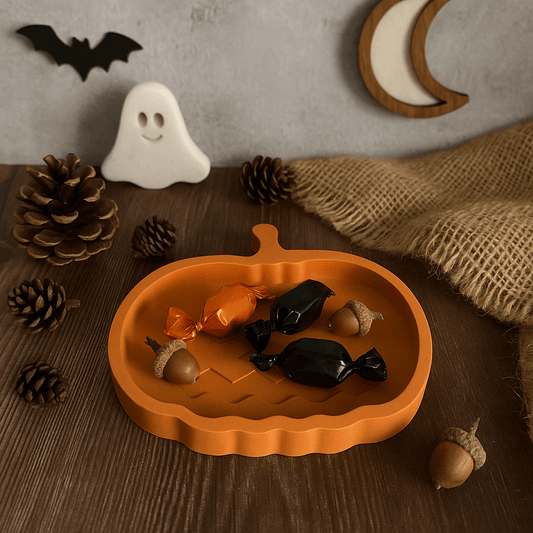 orange pumpkin tray displayed with sweets 