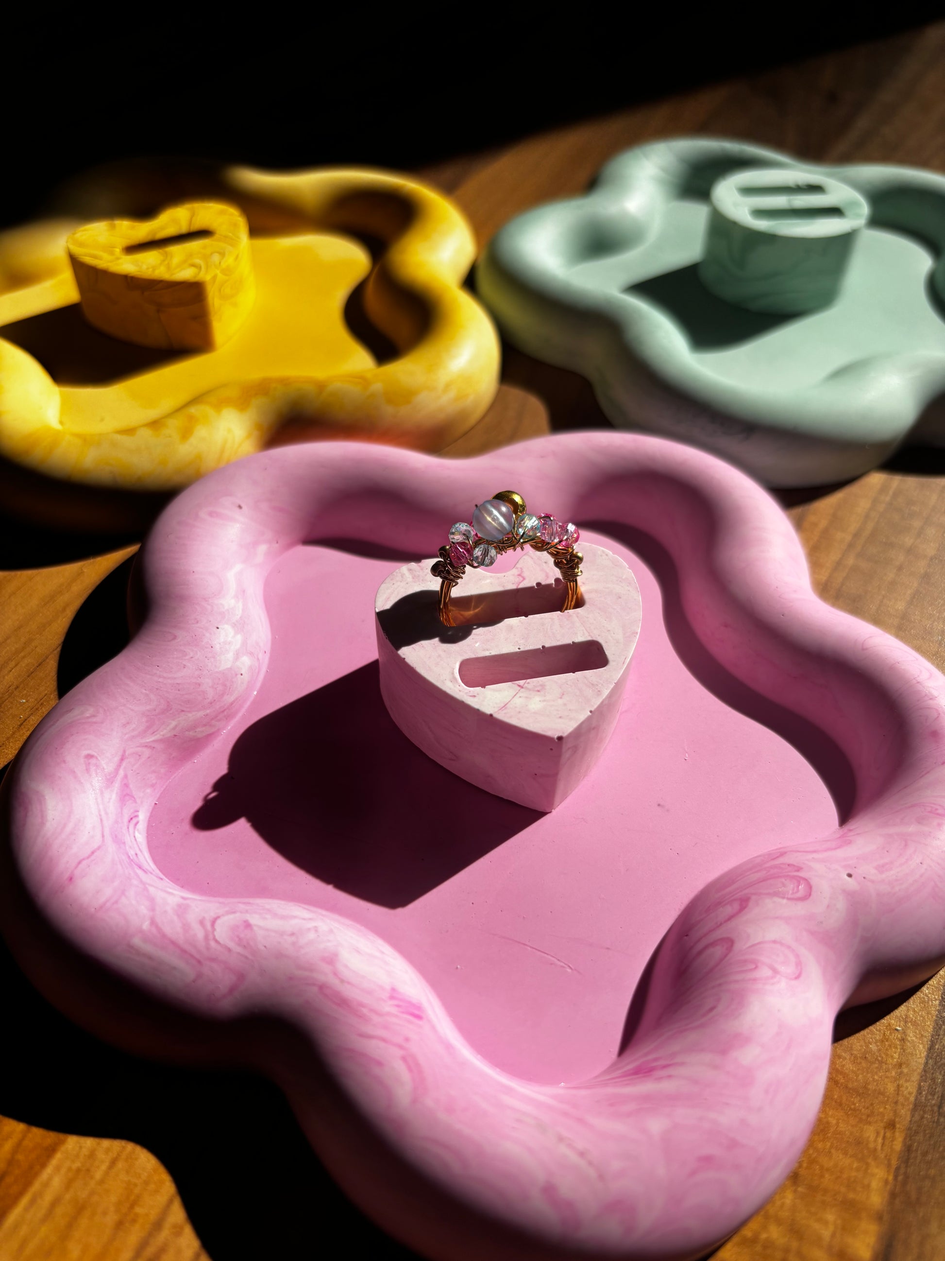 Custom rings in ring holder on flower tray 