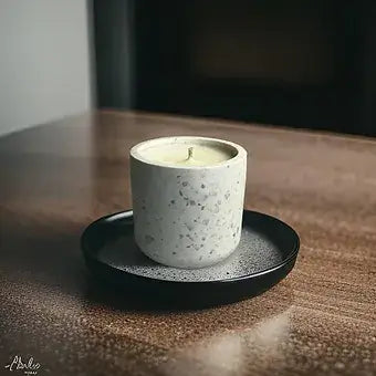 Handmade Afternoon Tea candle in a unique concrete pot on a black tray, featuring eco-friendly materials.
